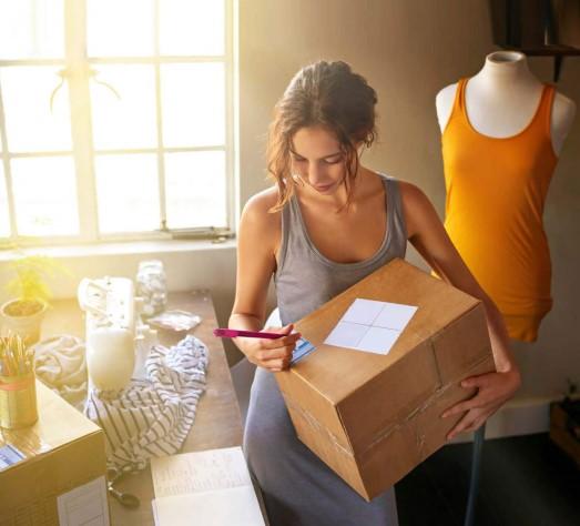 Woman marking package