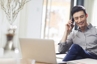 Man sitting in front computer