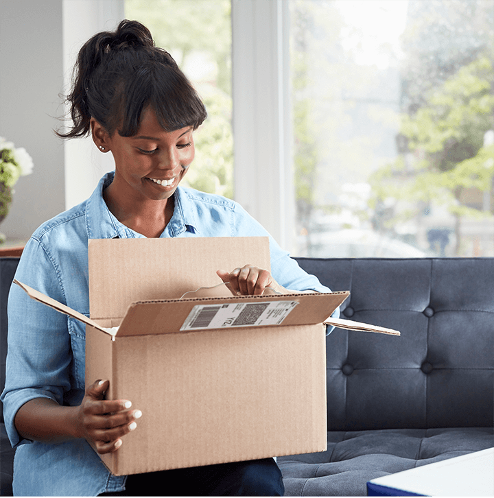 Women opening box