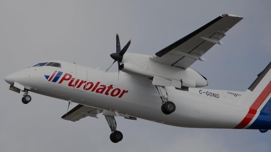 Purolator airplane flying