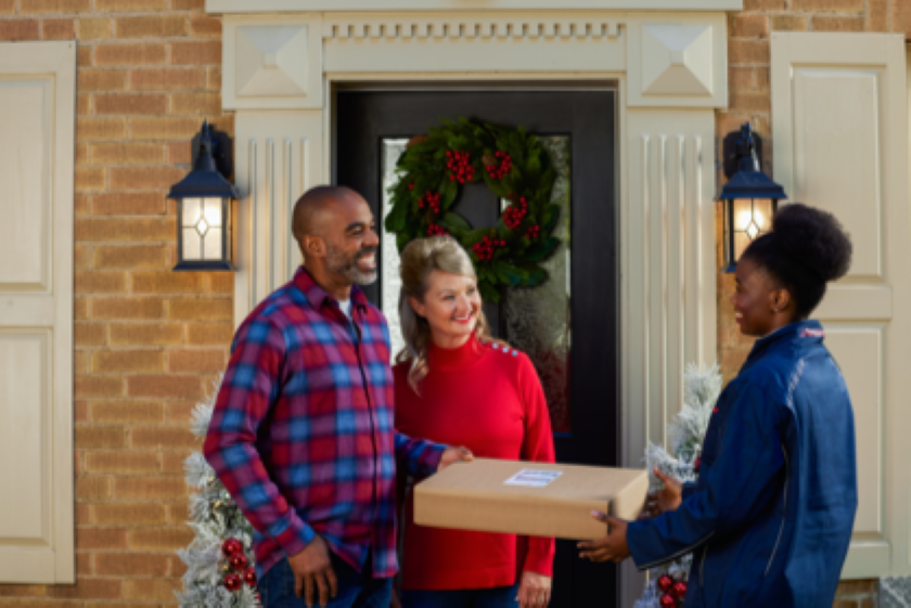 package handed over in front of a house